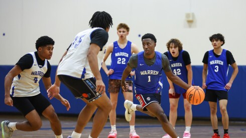 Warren’s Jaxson Davis (1) works a drill during a preseason practice.