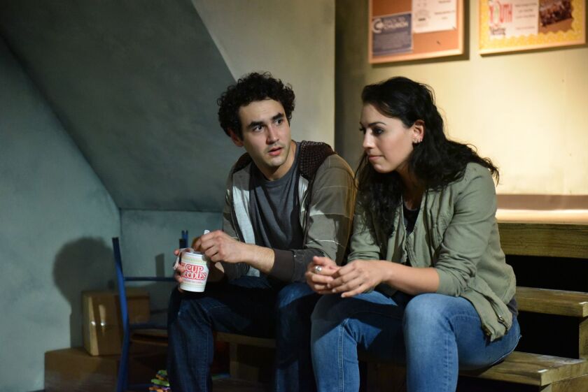 Raphael Diaz stars as Josh and Paloma Nozicka portrays Michaela in the Chicago premiere of “The Harvest.” | Michael Courier