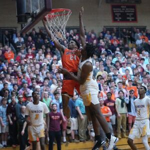 Brother Rice’s Marquise Kennedy (24) against Simeon’s Sincere Callwood (4) (4), Friday 03-01-19. Worsom Robinson/For Sun-Times