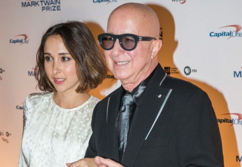 Musician Paul Shaffer and his daughter, Victoria Shaffer, pose for a portrait before the 19th Annual Mark Twain Award for American Humor program honoring Bill Murray at The Kennedy Center October 19, 2016 in Washington, DC. / AFP PHOTO / ZACH GIBSONZACH /