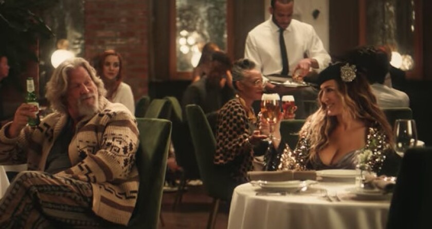 Jeff Bridges and Sarah Jessica Parker in the Stella Artois Super Bowl ad. | YouTube