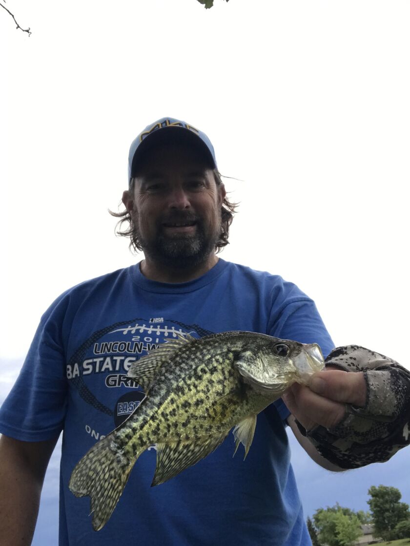Ken “Husker” O’Malley with a summer crappie. Provided photo