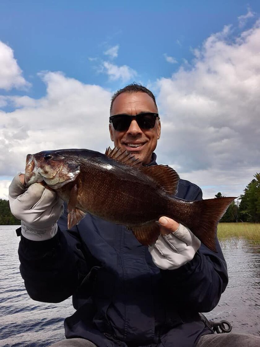 Rob Abouchar with a Labor Day smallmouth bass from the Wisconsin River. Provided photo