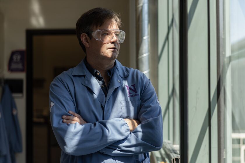 Northwestern University Chemistry Professor William Dichtel, whose research found a way to destroy per-and polyfluoroalkyl substances, also known as PFAs, which can cause adverse health effects, stands in his laboratory at Northwestern University in Evanston, Ill., Thursday, Sept. 1, 2022.