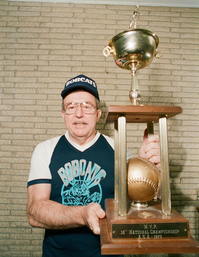 Ed Zolna, a famed softball pitcher, shows his 1973 MVP trophy. He was the only Chicago player inducted into the Amateur Softball Association Hall of Fame. He died Tuesday at his home in Frankfort. He was 85. | Sun-Times file photo