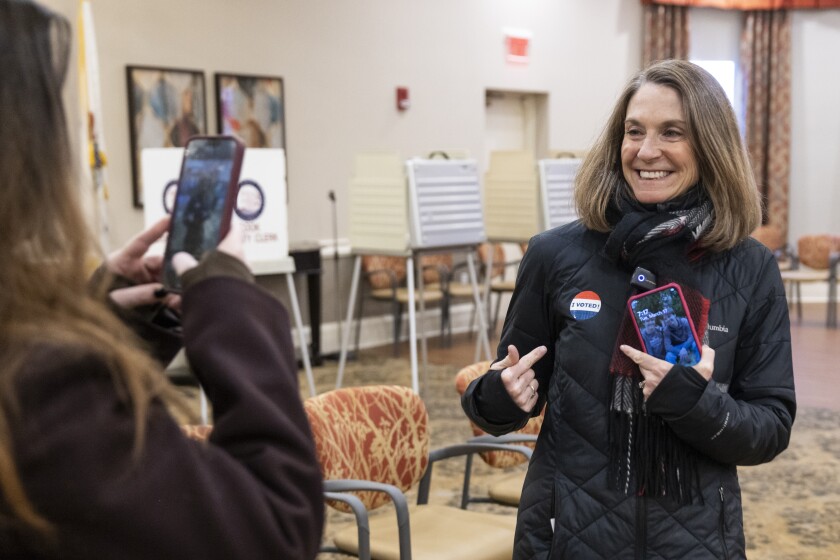 State Sen. Laura Fine, Democratic primary candidate for Illinois' 9th congressional district, shows off her “I Voted!” sticker after voting in the 2026 primary election at the Vi at The Glen retirement community in Glenview, Tuesday, March 17, 2026. | Ashlee Rezin/Sun-Times