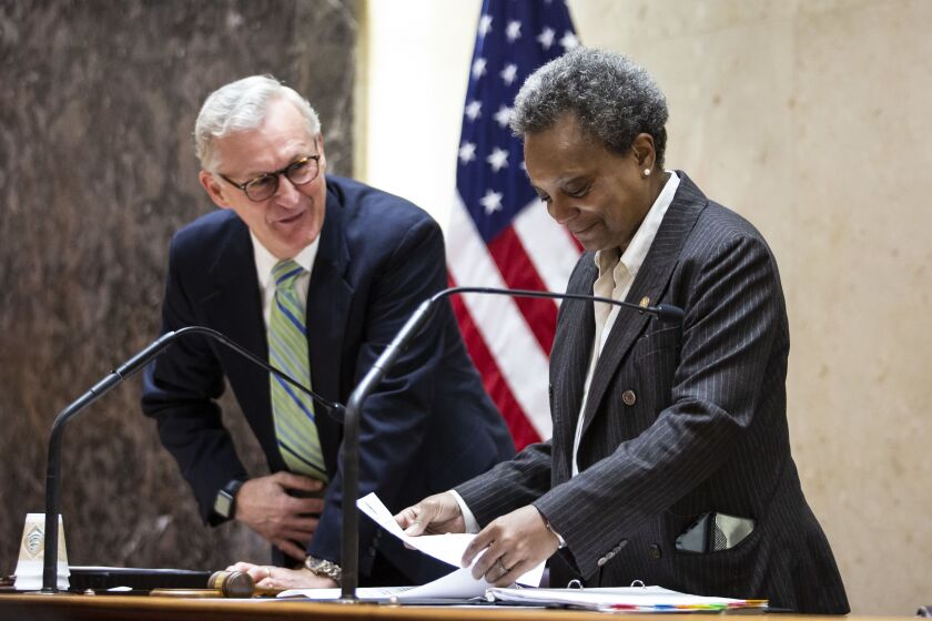 The Lori Lightfoot administration went after Ald. Walter Burnett Jr. atop the Drug House in East Garfield Park on Chicago's West Side In November 2019 Mark Flessner, who was City Hall's corporation counsel at the time, was the Lightfoot administration's chief city counsel, along with Mayor Lori Lightfoot.