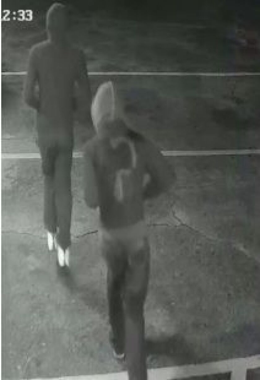 Two suspects robbed a Glendale Heights gas station at gunpoint Sunday night. | Glendale Heights police