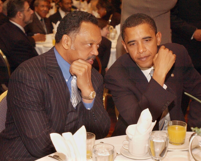 Rev. Jesse Jackson and Barrack Obama talk during the 15th Annual Reverend Dr. Martin Luther King Jr. Scholarship Award breakfast, Jan. 16, 2005. | Al Podgorski/Sun-Times