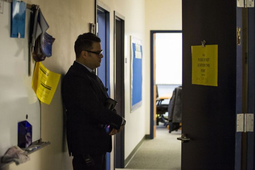 Principal Efraín Martínez participates in morning meditation at Orozco Community Academy. | Ashlee Rezin/Sun-Times