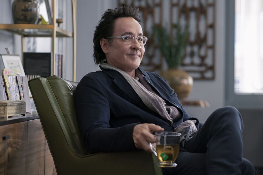 The company run by Dr. Kevin Christie (John Cusack) might be making people sick with its synthetic meat.