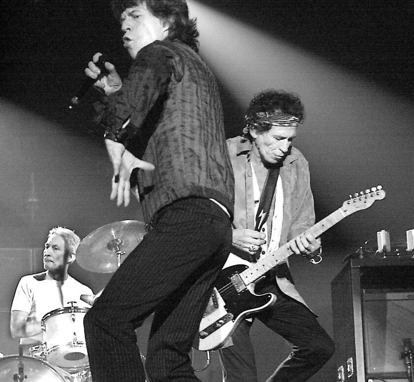 Charlie Watts (from left), Mick Jagger and Keith Richards perform during a Rolling Stones concert at the Aragon Ballroom on Sept. 15, 2002. | Sun-Times photo by Tom Cruze.