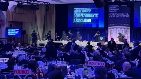 U.S. Secret Service agents respond near President Donald Trump during the White House Correspondents Dinner on Saturday, April 25, 2026, in Washington after shots were fired outside the ballroom.