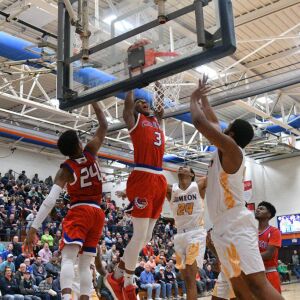 Curie’s DaJuan Gordon (3) gets a tip dunk over Simeon, Saturday 12-29-18. Worsom Robinson/For Sun-Times