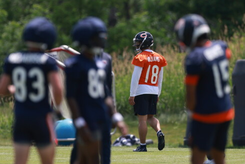 Bears quarterback Caleb Williams (18) stands on the field during minicamp at Halas Hall on June 10, 2026.