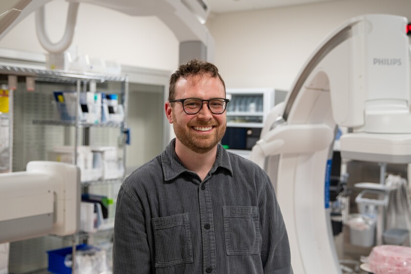 Lucas Wittwer, 31, stands in one of the University of Chicago Medicine Center for Care and Discovery operating rooms on Wednesday, May 6, 2026.