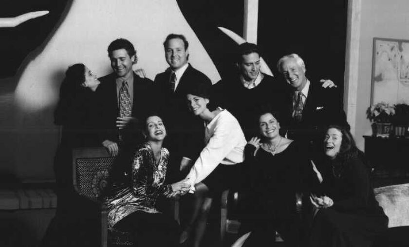 Beatriz Bensinger (front row, second from right, with her husband Roger’s hand on her shoulder), and their seven children and stepchildren. | Family photo