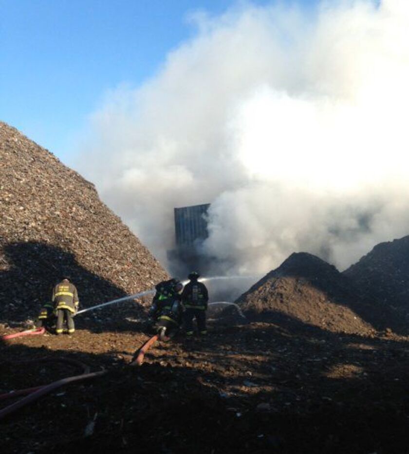 Crews battle a Ranch Triangle scrap yard fire Sunday morning. | Chicago Fire Department