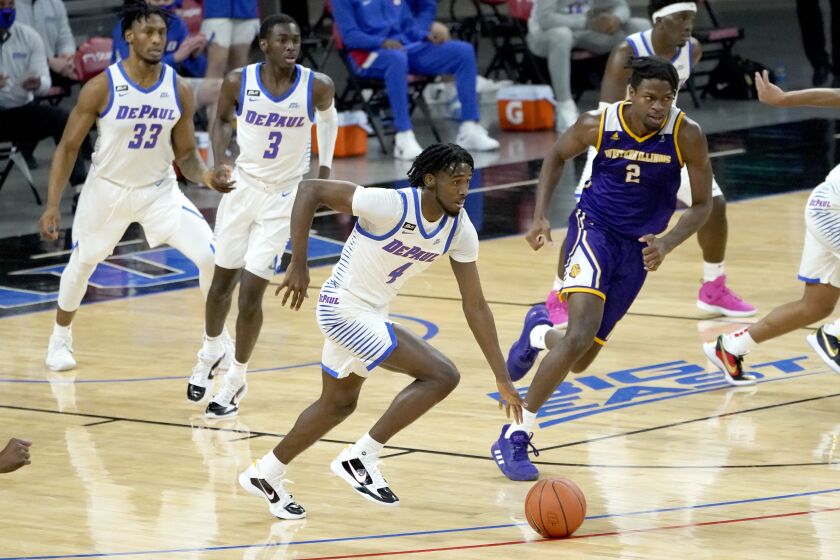 DePaul’s Javon Freeman-Liberty (4) starts a fast break during the first half of an NCAA college basketball game against Western Illinois.