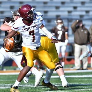 Montini’s Robert Brazziel (7) throws a touchdown. Worsom Robinson/For the Sun-Times.