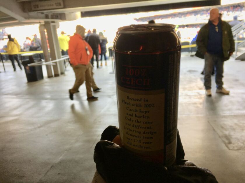 Beer cans are back in the hands of fans at Soldier Field this year. For years, vendors were required to first pour beers in plastic cups. | Chicago Sun-Times staff photo