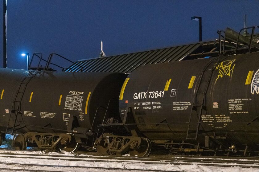 A freight train derailed Monday afternoon damaging the Cicero Metra Southbound platform. | Tyler LaRiviere/Sun-Times