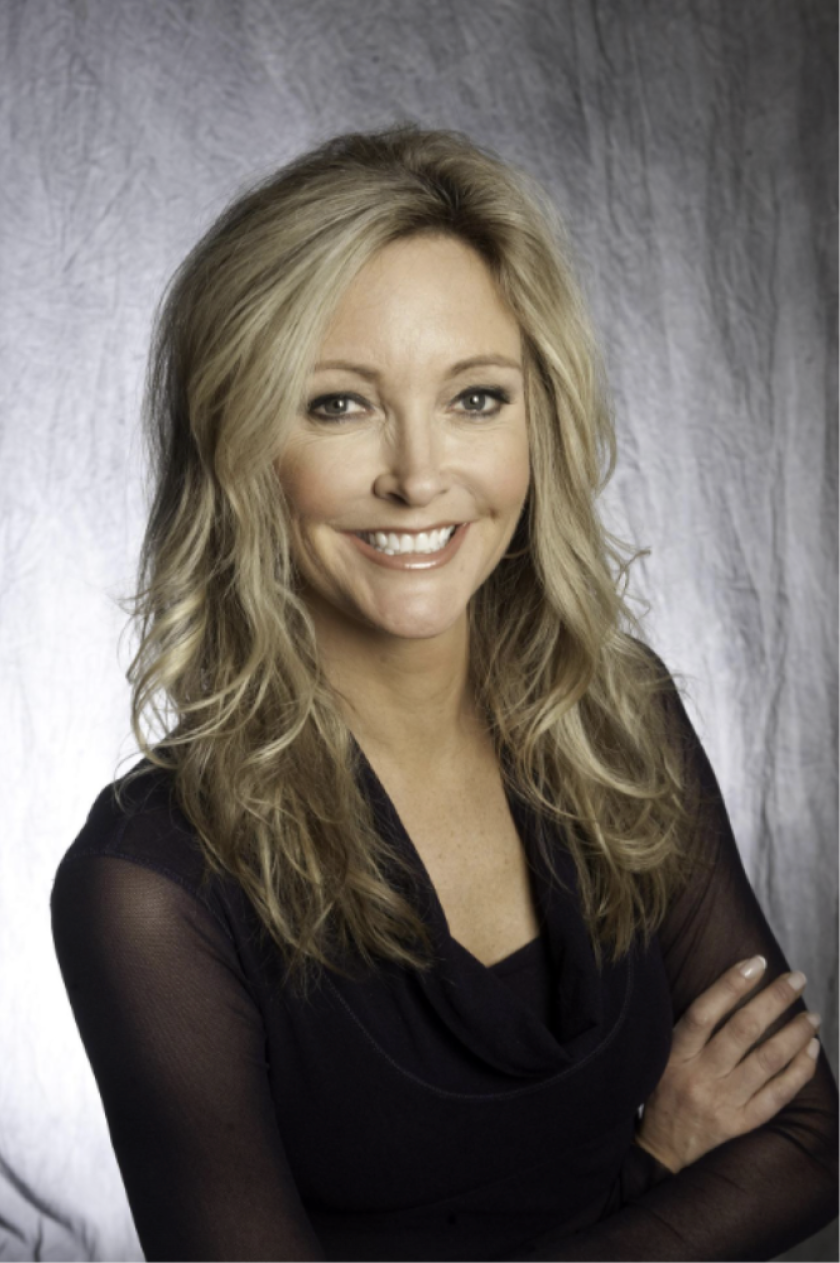 Radio talk show host Amy Jacobson resigns as Amundsen volleyball coach ...