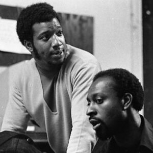 Fred Hampton and R. Chaka Walls, deputy minister of information for the Black Panther Party, Ill, discuss the fate of Bobby Seale in November 1969.