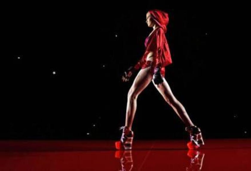 A model displays an Autumn/Winter design by Andres Sarda at Madrid’s Fashion Week in Madrid, Spain, Saturday, Feb. 7, 2015 . (AP Photo/Daniel Ochoa de Olza) ORG XMIT: DO140