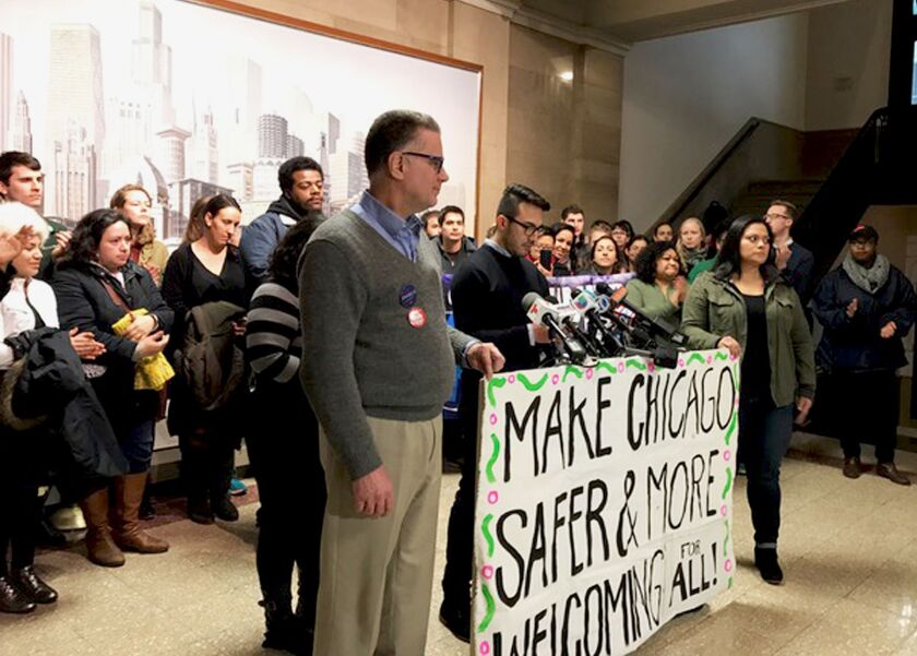 Immigration activists held a news conference at City Hall in January to push for closing loopholes in Chicago’s Welcoming City ordinance. Those “carve-outs,” as they are called, allow police to provide information about some people to federal immigration