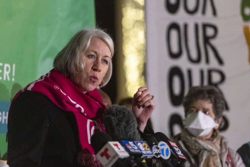Jennifer Welch, president of Planned Parenthood of Illinois speaks to around a hundred abortion rights activists, during an abortion rights rally in Federal Plaza, Wednesday, Dec. 1, 2021.