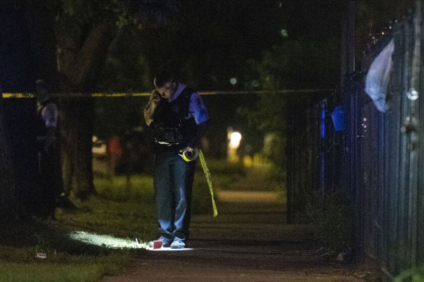Police investigate the scene where a man was shot Friday morning near Independence and Fillmore. | Tyler LaRiviere/Sun-Times