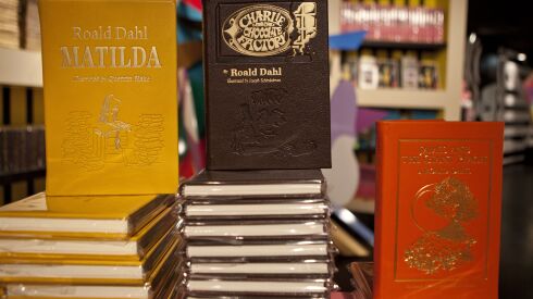 Books by Roald Dahl are displayed at the Barney’s store on East 60th Street in New York in 2011. Critics are accusing the publisher of Dahl’s classic children’s books of censorship after it removed colorful language from stories such as “Charlie and the Chocolate Factory” and “Matilda” to make them more acceptable to modern readers.