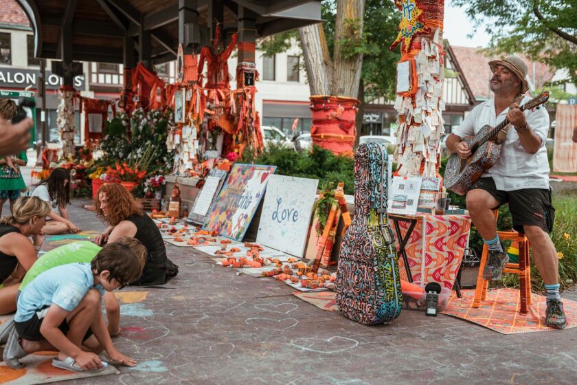 ‘What I couldn’t have anticipated is how much people needed a thing to do with their hands to help kind of deal with this,’ said Jacqueline Von Edelberg, who helped start the memorial to those killed in the Highland Park Fourth of July parade mass shooting. ‘They didn’t need instructions.”