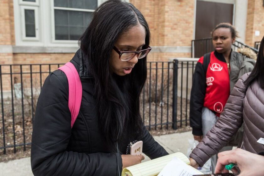 Lizzy Russell, a senior at Bronzeville Scholastic Institute, reacts to CPS inspection reports of the school. | Erin Brown/Sun-Times
