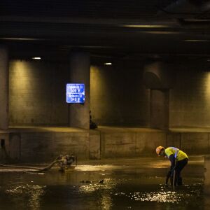 City workers remove water from Lower Wacker Drive near Randolph Street after overnight flooding, Monday morning, May 18, 2020.