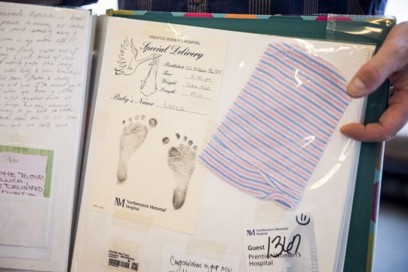 Chicago Sun-Times reporter Stefano Esposito displays one of the six scrapbooks of letters he’s compiled from the letters he writes once a month to each of his two sons. | Ashlee Rezin / Sun-Times