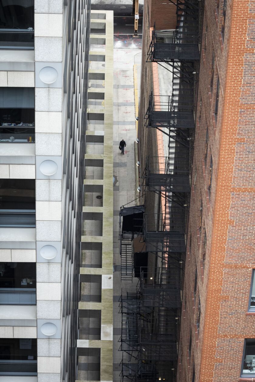 Amid fears of the coronavirus pandemic and a stay-at-home order from Gov. J.B. Pritzker, few pedestrians and minimal traffic could be seen in the Loop from the roof of City Hall during the Wednesday morning commute, April 1, 2020.