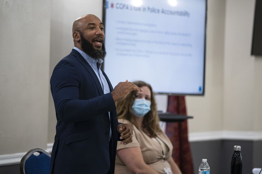 Ephraim Eaddy, spokesman for the Civilian Office of Police Accountability, speaks during a public forum Tuesday.