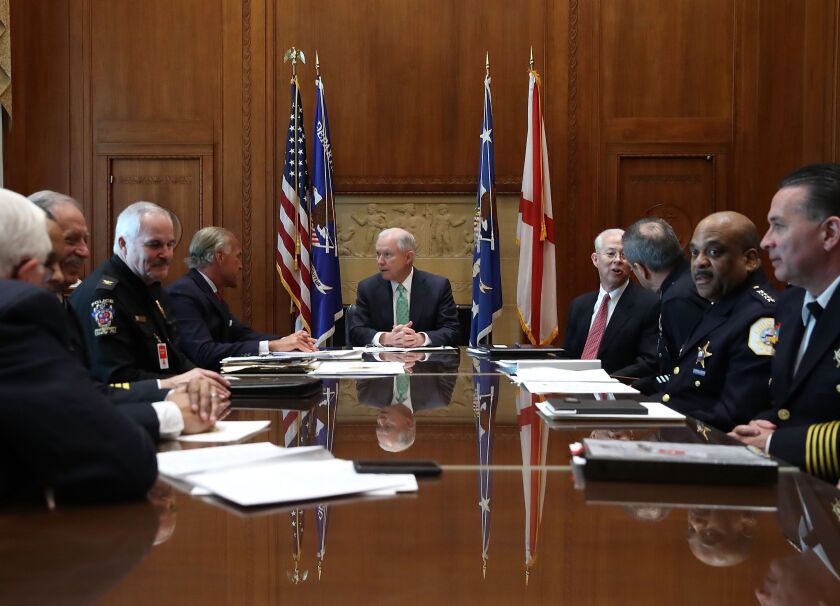 Attorney General Jeff Sessions (center) meets with big-city police chiefs, including Supt. Eddie Johnson (second from right), at the Justice Department on Thursday. | Getty Images