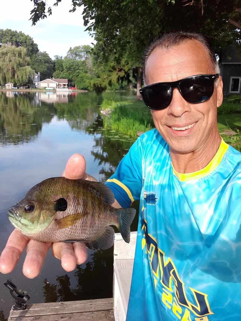 Rob Abouchar with a bluegill from Island Lake. Provided photo