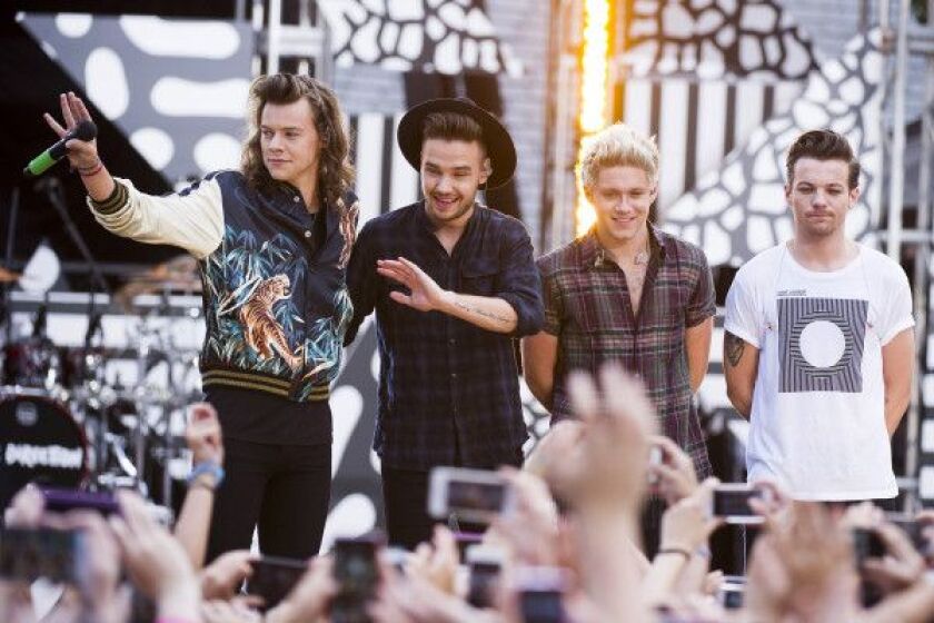 One Direction members, from left, Harry Styles, Liam Payne, Niall Horan and Louis Tomlinson perform on ABC’s “Good Morning America” at Rumsey Playfield/SummerStage on Tuesday, Aug. 4, 2015, in New York. (Photo by Charles Sykes/Invision/AP)