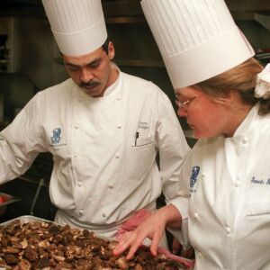 Chef Sarah Stegner looking over a tray of newly delivered morel mushrooms. |Ellen Domke Sun-Times