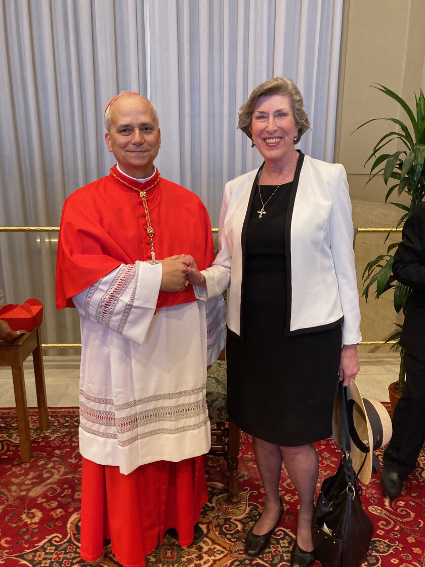 Sister Barbara Reid, president of Catholic Theological Union, stands with Cardinal Robert Francis Prevost in 2023. Reid predicts that Pope Leo XIV will follow in the footsteps of Pope Francis.