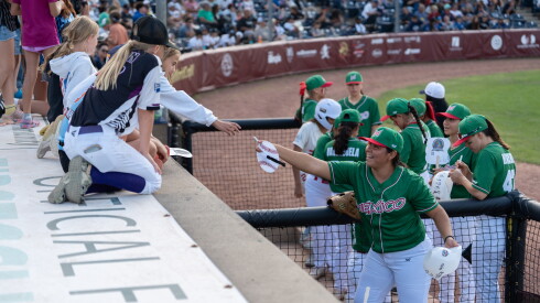 Members of the Mexican national women's baseball team sign autographs for children at the Women's Baseball World Cup in Rockford Thursday, July 23, 2026.