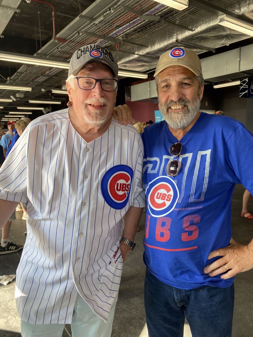 London fans Pete Smith (left) and Edward Reney (right) have attended both of MLB’s London Series, supporting Reney’s Red Sox in 2019 and Smith’s Cubs this year.