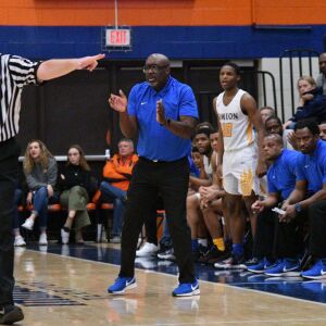 Simeon coach Robert Smith cheers his team on against Curie, Saturday 12-29-18. Worsom Robinson/For Sun-Times