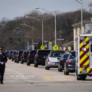 Led by a procession of hundreds of law enforcement vehicles, the hearse carrying Chicago Police Officer Officer Marco DiFranco leaves Cumberland Funeral Chapels and heads toward All Saints Catholic Cemetery & Mausoleum in Des Plaines, Thursday, April 9, 2020.