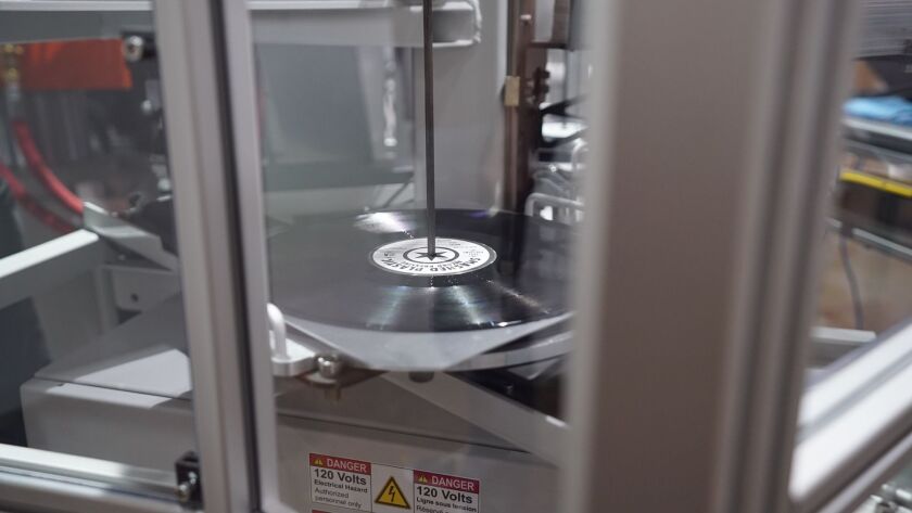 A record in the production process at Smashed Plastic. | Nader Issa/Sun-Times