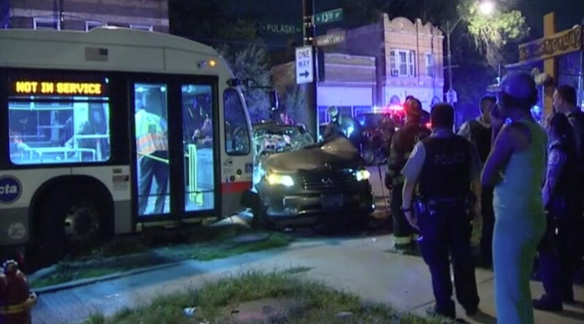 The aftermath of a collision last July 6 involving a sport-utility vehicle and a CTA bus on Pulaski Road in North Lawndale. | Network Video Productions